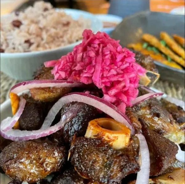 Beef with rice and red beans served with a salad of your choice