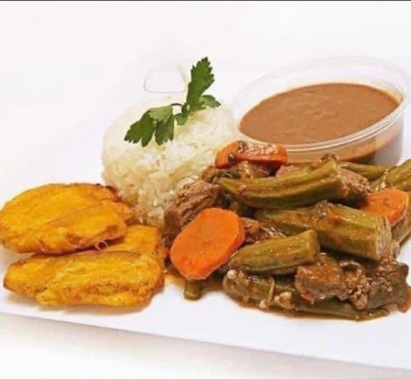 White rice, calalou with beef.