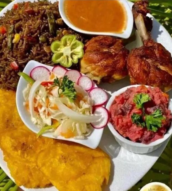 Fried chicken, vegetable rice with a variety of salads